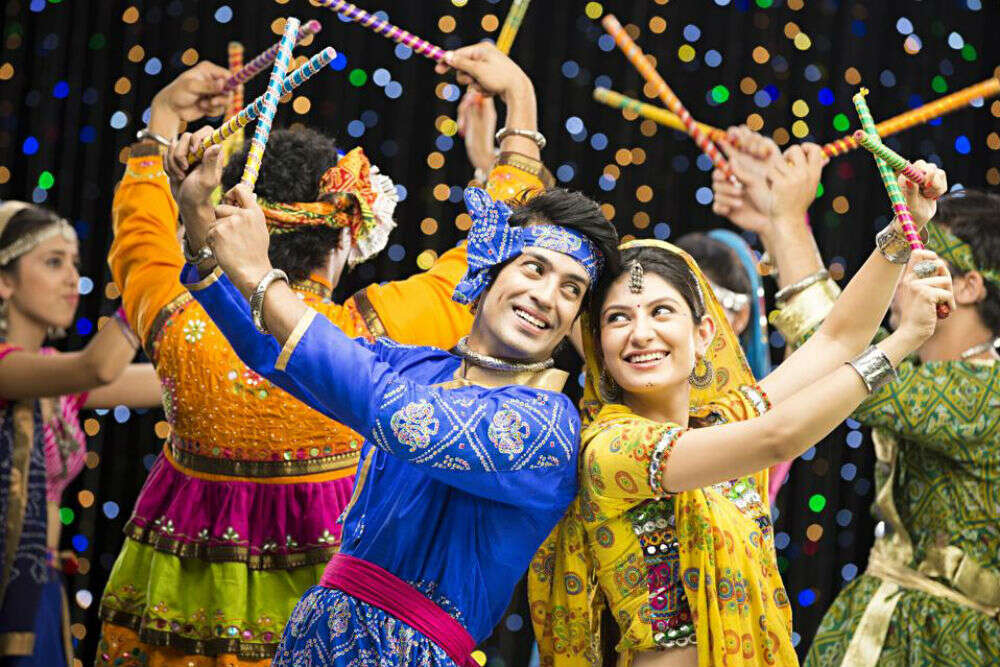 Garba dancers in colourful traditional outfits